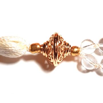 Close up of Handmade Energising Mala Necklace – Quartz & Rudrakshae gold guru filigree bead